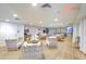 Hotel lounge area with comfortable seating, tables, beverage station and TV on the wall at 1126 Ocean Blvd # 109116230, Isle of Palms, SC 29451