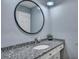 Stylish bathroom featuring a granite countertop, modern sink, and a large mirror at 1228 Brookside Dr, Hanahan, SC 29410