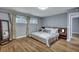 Bedroom featuring hardwood floors, bright natural light and modern decor at 1228 Brookside Dr, Hanahan, SC 29410