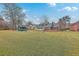 Large backyard with screened porch, and a storage shed at 131 Londonderry Rd, Goose Creek, SC 29445