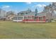 This home features a large, private backyard with a screened porch and large deck for outdoor enjoyment at 131 Londonderry Rd, Goose Creek, SC 29445