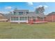 This home features a screened porch and a large backyard with a spacious deck at 131 Londonderry Rd, Goose Creek, SC 29445