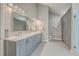 Modern bathroom with dual sinks, a large mirror, recessed lighting, and a spacious walk-in shower at 131 Londonderry Rd, Goose Creek, SC 29445