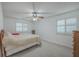 Cozy bedroom featuring neutral walls, plush carpeting and a ceiling fan to ensure relaxation at 131 Londonderry Rd, Goose Creek, SC 29445