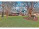 Charming two-story brick home with a well-manicured lawn and colorful landscaping at 131 Londonderry Rd, Goose Creek, SC 29445