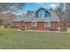 Brick home with manicured lawn, showcasing the home's exterior and curb appeal at 131 Londonderry Rd, Goose Creek, SC 29445