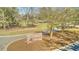 Charming brick entrance to the golf course with manicured landscaping and clear signage at 131 Londonderry Rd, Goose Creek, SC 29445