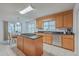 Kitchen with a cooktop island, stainless steel appliances, and tile flooring at 131 Londonderry Rd, Goose Creek, SC 29445