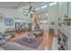 Bright living room with a fireplace and cathedral ceilings offering a lot of space at 131 Londonderry Rd, Goose Creek, SC 29445
