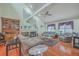 Spacious living room with a fireplace, hardwood floors, and elegant decor at 131 Londonderry Rd, Goose Creek, SC 29445