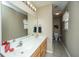 Well-lit bathroom with a double vanity, large mirror, and decorative accents, offering a functional and stylish space at 1320 Garland St, North Charleston, SC 29420
