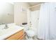 Standard bathroom featuring a shower-tub combo with curtain, single sink vanity, and neutral walls at 1320 Garland St, North Charleston, SC 29420
