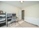 Bright bedroom with a desk, office chair, and dresser, providing a versatile space for work and relaxation at 1320 Garland St, North Charleston, SC 29420
