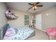 Playful bedroom featuring a cozy bed, a toy hammock, and fun decor, creating an inviting and imaginative space at 1320 Garland St, North Charleston, SC 29420