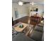 Cozy living room with hardwood floors, a patterned rug, and a comfortable gray sofa, creating a relaxing atmosphere at 1320 Garland St, North Charleston, SC 29420