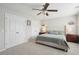 Bedroom with neutral tones, carpet, and a comfortable bed with a tufted headboard at 1413 Tannery, Johns Island, SC 29455