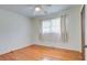 Comfortable bedroom with polished hardwood floors, a ceiling fan, and natural light at 1418 Kentwood Circle Cir, Charleston, SC 29412