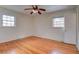 Neutral bedroom with hardwood floors, a ceiling fan, and good natural lighting at 1418 Kentwood Circle Cir, Charleston, SC 29412