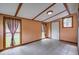 Sunroom with tiled floor, ample natural light, and access to backyard at 1418 Kentwood Circle Cir, Charleston, SC 29412