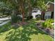 Well-maintained front yard with healthy grass and trimmed shrubbery at 1481 Clarendon Way, Mount Pleasant, SC 29466