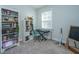 Bedroom with a keyboard, chair, and bookshelf at 1610 Mermentau St, Mount Pleasant, SC 29466