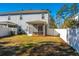 View of the home's backyard, showcasing the screened porch and grill area, ideal for outdoor entertaining at 1610 Mermentau St, Mount Pleasant, SC 29466