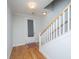Entryway area with hardwood floors and a front door with a glass window at 1610 Mermentau St, Mount Pleasant, SC 29466