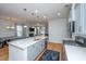 Open kitchen design featuring an island, stainless appliances, and sleek countertops at 1610 Mermentau St, Mount Pleasant, SC 29466