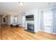 Comfortable living room with a fireplace and a mounted television at 1610 Mermentau St, Mount Pleasant, SC 29466