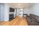 Inviting living room with a fireplace and sliding doors leading to the patio at 1610 Mermentau St, Mount Pleasant, SC 29466