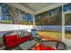 Relaxing screened porch with outdoor seating and views of the backyard at 1610 Mermentau St, Mount Pleasant, SC 29466