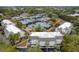 Aerial view of townhouses and tennis courts, with lush greenery and a serene environment at 1613 Live Oak Park, Seabrook Island, SC 29455