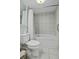 Clean bathroom with a standard toilet and white tiled shower/tub at 1613 Live Oak Park, Seabrook Island, SC 29455