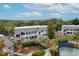 Beautiful townhouse with charming balconies and lush greenery surrounding the building at 1613 Live Oak Park, Seabrook Island, SC 29455