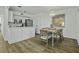Charming kitchen with stainless steel appliances and adjacent dining area with chandelier at 1613 Live Oak Park, Seabrook Island, SC 29455