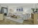 Bright living room with modern decor, lots of seating and a sliding glass door at 1613 Live Oak Park, Seabrook Island, SC 29455