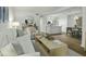 Spacious living room with an open floor plan that connects to the kitchen and dining areas at 1613 Live Oak Park, Seabrook Island, SC 29455