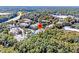 Aerial view of the property nestled among lush trees within the community at 1623 Telfair Way, Charleston, SC 29412
