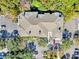 Aerial view of a building showcasing its roof, parking lot and surrounding trees at 1623 Telfair Way, Charleston, SC 29412