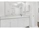Bright bathroom featuring a large mirror, modern sink, and white cabinetry at 1623 Telfair Way, Charleston, SC 29412