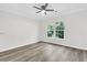 Bedroom featuring hardwood floors and a large window at 1623 Telfair Way, Charleston, SC 29412