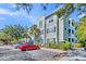 Exterior of three-story condo building shows parking and landscaping at 1623 Telfair Way, Charleston, SC 29412