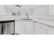 Bright kitchen featuring stainless steel appliances, white cabinetry, and light countertops at 1623 Telfair Way, Charleston, SC 29412