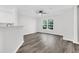 Inviting living room featuring hardwood floors and a ceiling fan at 1623 Telfair Way, Charleston, SC 29412