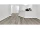 Open-concept living room with wood floors and lots of natural light at 1623 Telfair Way, Charleston, SC 29412