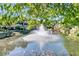 Beautiful pond with fountain and surrounding condos for a resort feel at 1623 Telfair Way, Charleston, SC 29412