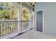 Covered porch with screen and pillars, creating a tranquil outdoor area at 1623 Telfair Way, Charleston, SC 29412
