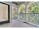Screened in porch with pillars, providing a shaded outdoor living space at 1623 Telfair Way, Charleston, SC 29412