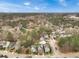 Expansive aerial view of a residential community, highlighting the density of homes and surrounding greenbelt at 1747 Towne St, Johns Island, SC 29455