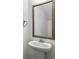 Bathroom featuring a decorative mirror above a pedestal sink at 1747 Towne St, Johns Island, SC 29455